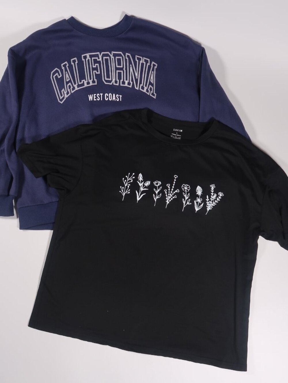 Lot of 2 SHEIN Black Floral Graphic Tee and Long Sleeve California Blue Sweater